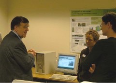 Clare Madge and Henrietta O'Connor demonstrating the project website
