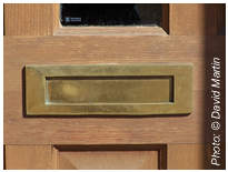 A letter box on an entrance door