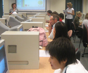 Image of participants working on their online questionnaires at the Leicester workshop, June 2007.